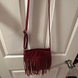 Women’s deep, red shoulder or side bag with fringes!!!